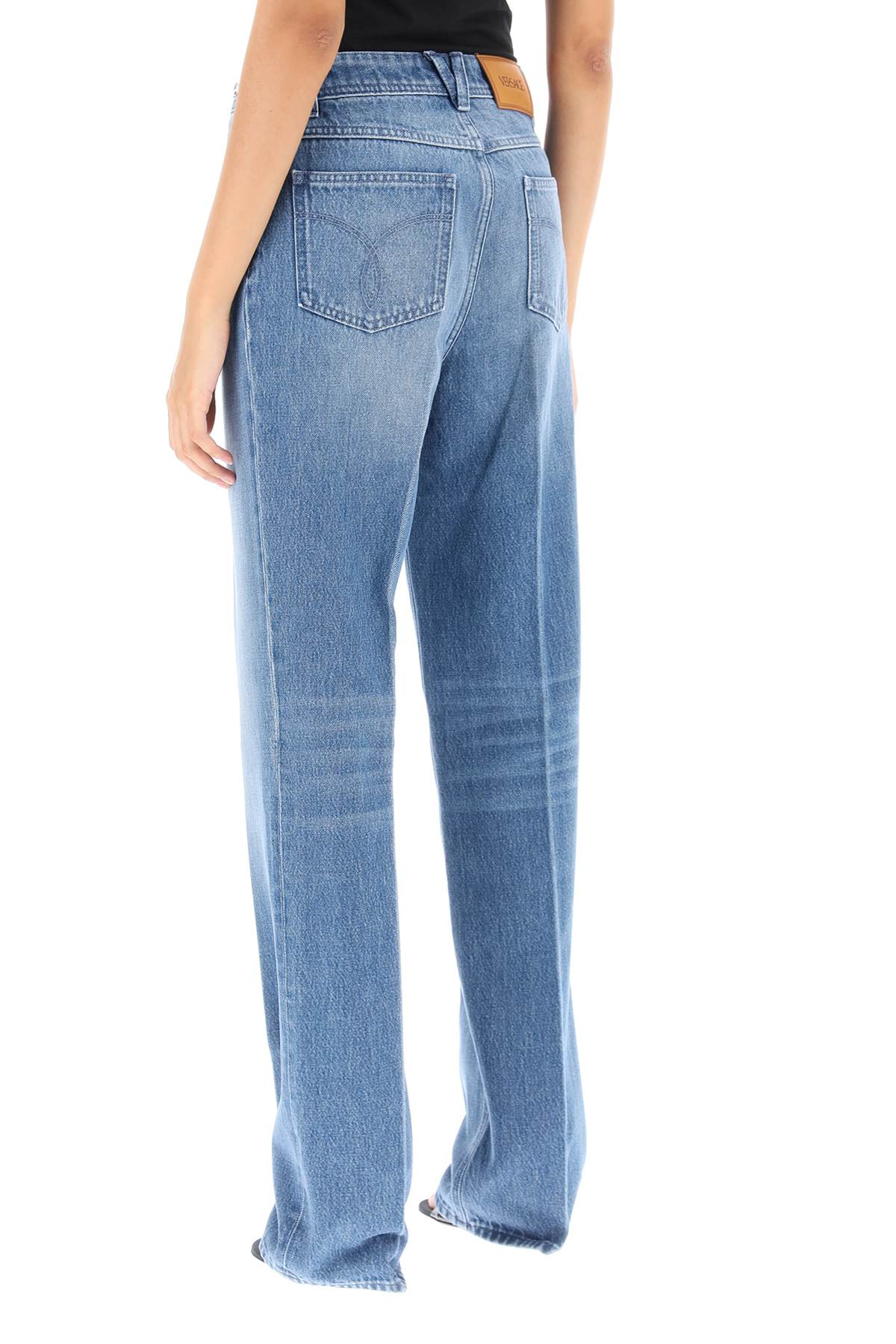 Versace boyfriend jeans with tailored crease