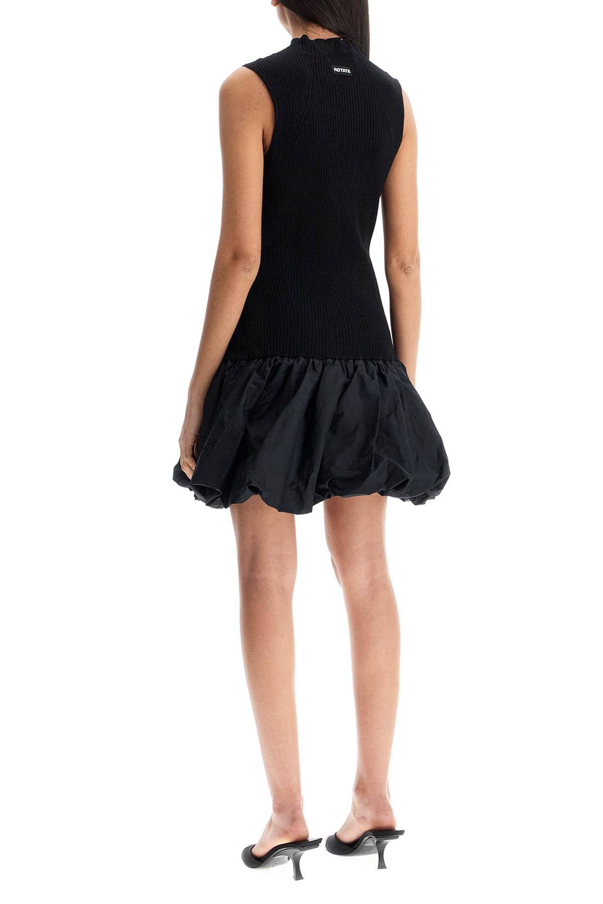 Rotate black knit racer cut dress with high neck and flared skirt