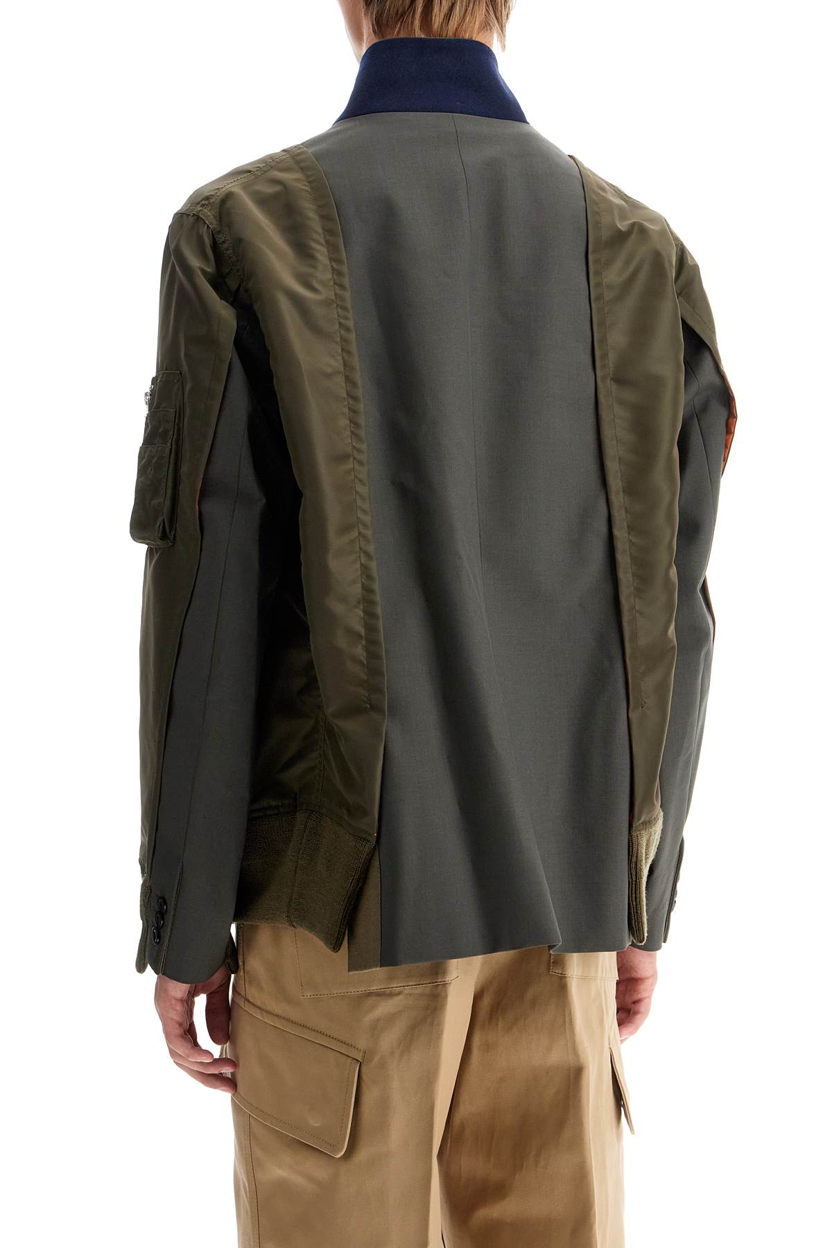 Sacai hybrid nylon and wool blend jacket.