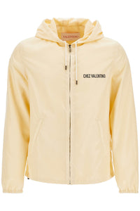 Valentino Garavani beige hooded windbreaker in logoed polyamide