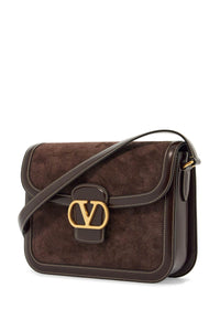 Valentino Garavani shoulder bag in dark brown suede with golden buckle