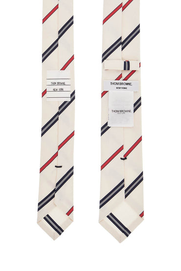 Thom Browne classic ivory tie with red and blue stripes in silk and cotton