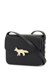 Maison Kitsune minimalist black leather bag with adjustable shoulder strap and glossy finish