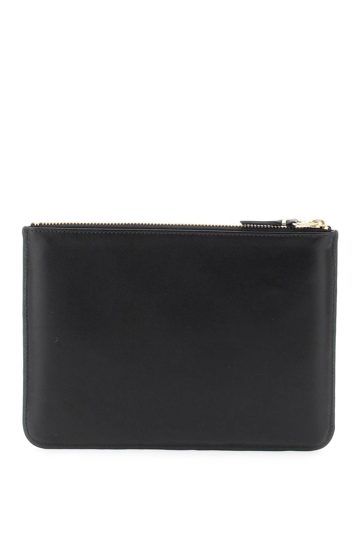 Comme Des Garcons Wallet leather pouch