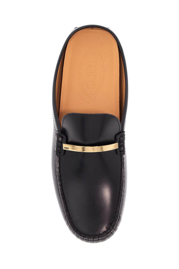 Tod'S black calfskin slip-on loafers with metallic strap and rubber sole